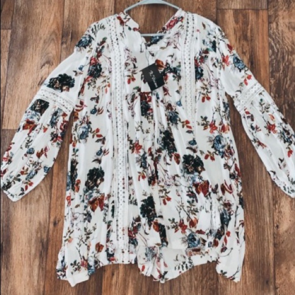 This dress is brand new. And a beautiful floral.